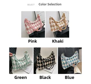Detail view of five different knit plaid shoulder bags in pink, khaki, green, black and blue
