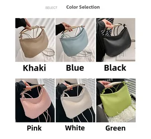 Minimalist pleated square bags in six colors with sleek golden metal handles