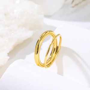 Minimalist double layer gold rings in polished titanium steel with glossy mirror finish