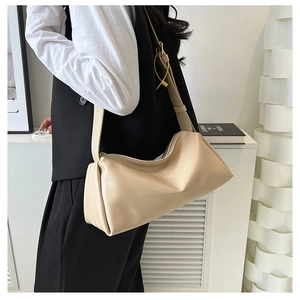 Minimalist beige shoulder bag with soft pleated PU leather and adjustable strap
