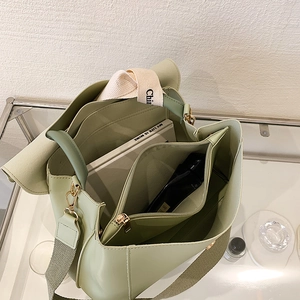 Sage green PU leather shoulder bag with multiple compartments and wide strap
