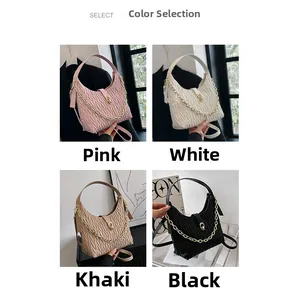 Borse a mano increspate nei colori rosa, bianco, kaki e nero con catena dorata