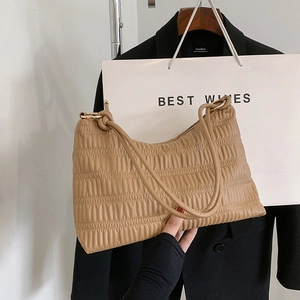 Camel ruched underarm bag in textured PU leather with knot detail and double straps
