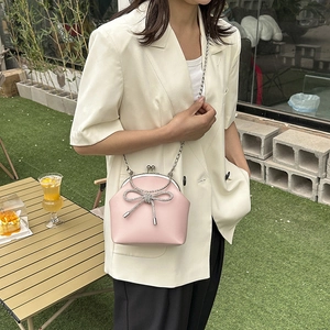 Pink leather bow shoulder bag with silver crystal buckle and metal chain strap