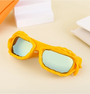 Detailed view of yellow Y2K wavy frame sunglasses with vibrant iridescent lenses