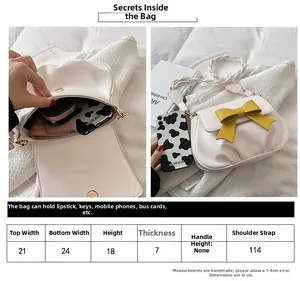 Tabella taglie e capacità della borsa a tracolla bianca in PU con fiocco giallo decor