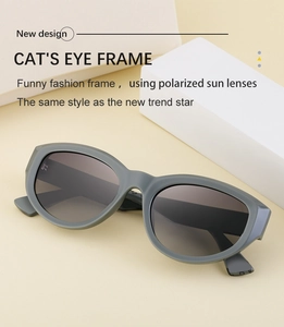 Detailed view of matte gray cat eye polarized sunglasses with gray gradient lenses