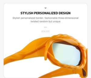 Detail of Y2K sunglasses with orange textured frame and blue reflective mirror lenses
