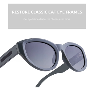 Detail of retro cat eye sunglasses with gray polarized lenses and matte blue frames