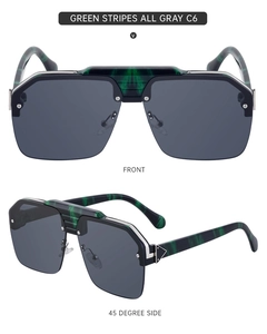 Dettaglio occhiali da sole punk semi-aperti a strisce verdi con lenti grigie Modello C6