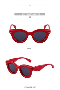 Vue de face et de côté de lunettes de soleil œil de chat rouges avec verres gris foncé