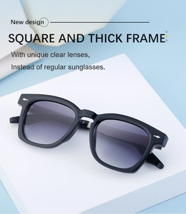 Detail of square thick frame sunglasses with silver arrow rivets and gradient lenses