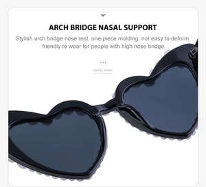Detail der Bogenbrücke Nasenpads an der Herz-Sonnenbrille mit Perlenverzierung