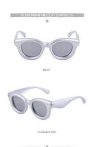 Détail de lunettes œil-de-chat argentées avec verres mercure et rivets dorés