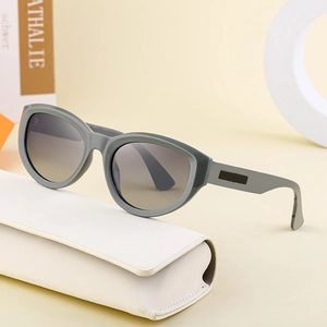 Polarized cat-eye sunglasses with grey gradient lenses and premium white leather case