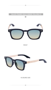 Detail view of square vintage sunglasses featuring gold temples and green-yellow gradient lenses