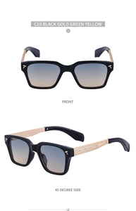 Détail de lunettes de soleil carrées avec logo T doré et branches à texture tissée