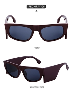 Detailansicht der kleinen Katzenaugen-Sonnenbrille mit breiten Bügeln in Rot-Grau