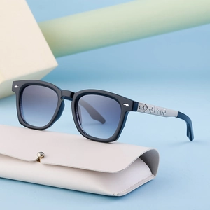 Square vintage sunglasses with blue gradient lenses and silver engraved metal temples