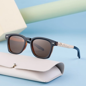 Classic square frame vintage sunglasses with dark brown lenses and a white leather case