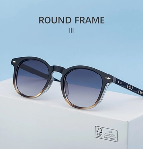Macro shot of square frame sunglasses with metal rivets on a white display stand