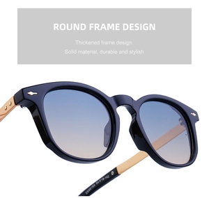 Close-up of square frame sunglasses with blue-to-pink gradient lenses and arrow rivets