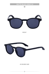 Front and side view of matte black vintage round sunglasses with engraved temples