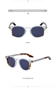 Detail view of square sunglasses with silver metal temples and decorative engravings