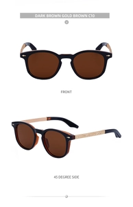 Detail of square sunglasses with gold engraved temples and dark brown lenses