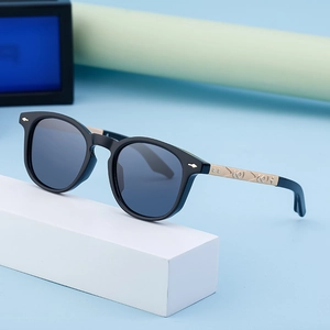 Modern square black sunglasses with embossed gold metal temples for outdoor sun protection