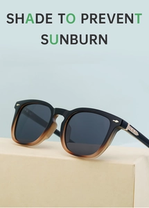 Detail of vintage square sunglasses with gradient frame and golden metal arrow accents