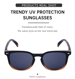 Detail of vintage square sunglasses featuring gradient frames and leopard texture temples