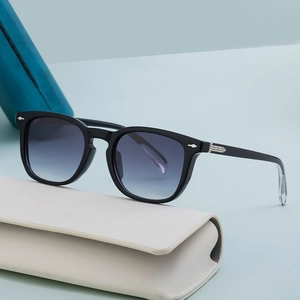 Classic black square sunglasses with gradient blue lenses and silver arrow studs