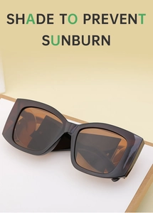 Fashionable dark brown tortoiseshell cat-eye sunglasses with large frame and gradient lenses