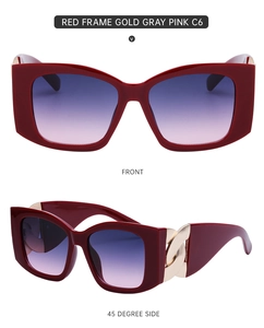 Cat eye sunglasses detail with wine red frame and gold metal chain temples