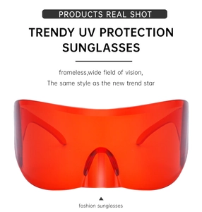 Detail view of frameless oversized sports sunglasses with red UV protection lenses