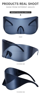 Front and side views of bright black wrap-around sports sunglasses with grey lenses
