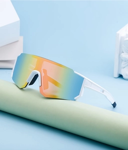 Detail view of white frame cycling sunglasses with rainbow polarized mirror lens on display
