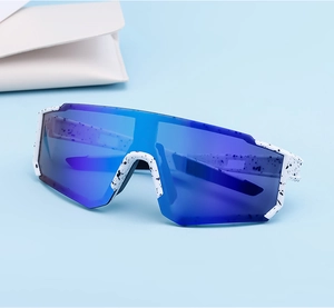 Detail of white sport sunglasses with black splash pattern and blue mirrored lenses