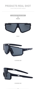 Detail of square polarized sunglasses with ink dot black frame and gray lenses
