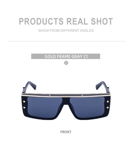 Detailed front view of gold metal square frame sunglasses with gray lenses and rivets
