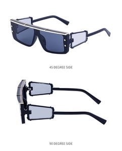 Cyberpunk square sunglasses with gold metal top line and geometric temple detail