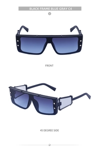 Detail view of black square sunglasses with blue gray lenses and hollow metal temples