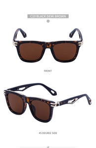 Detail view of square tortoise shell sunglasses with hollow metal temple design