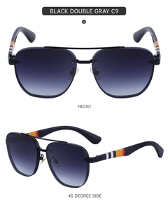 Detail of aviator rimless sunglasses with black double gray lenses and striped temples