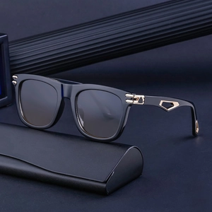Chic black square frame sunglasses with gold geometric accents and leather case