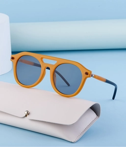 Steampunk sunglasses with amber double-bridge frame and stylish leather storage case