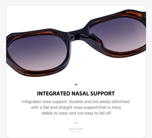 Detail of dark tortoiseshell sunglasses featuring integrated nasal support and purple lenses