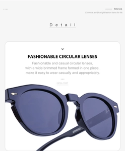 Detail view of oval blue frame sunglasses with metal arrow accents and ZS98092 model info