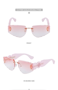 Detail of rimless pink gradient lenses with golden deer head emblem on wide temples